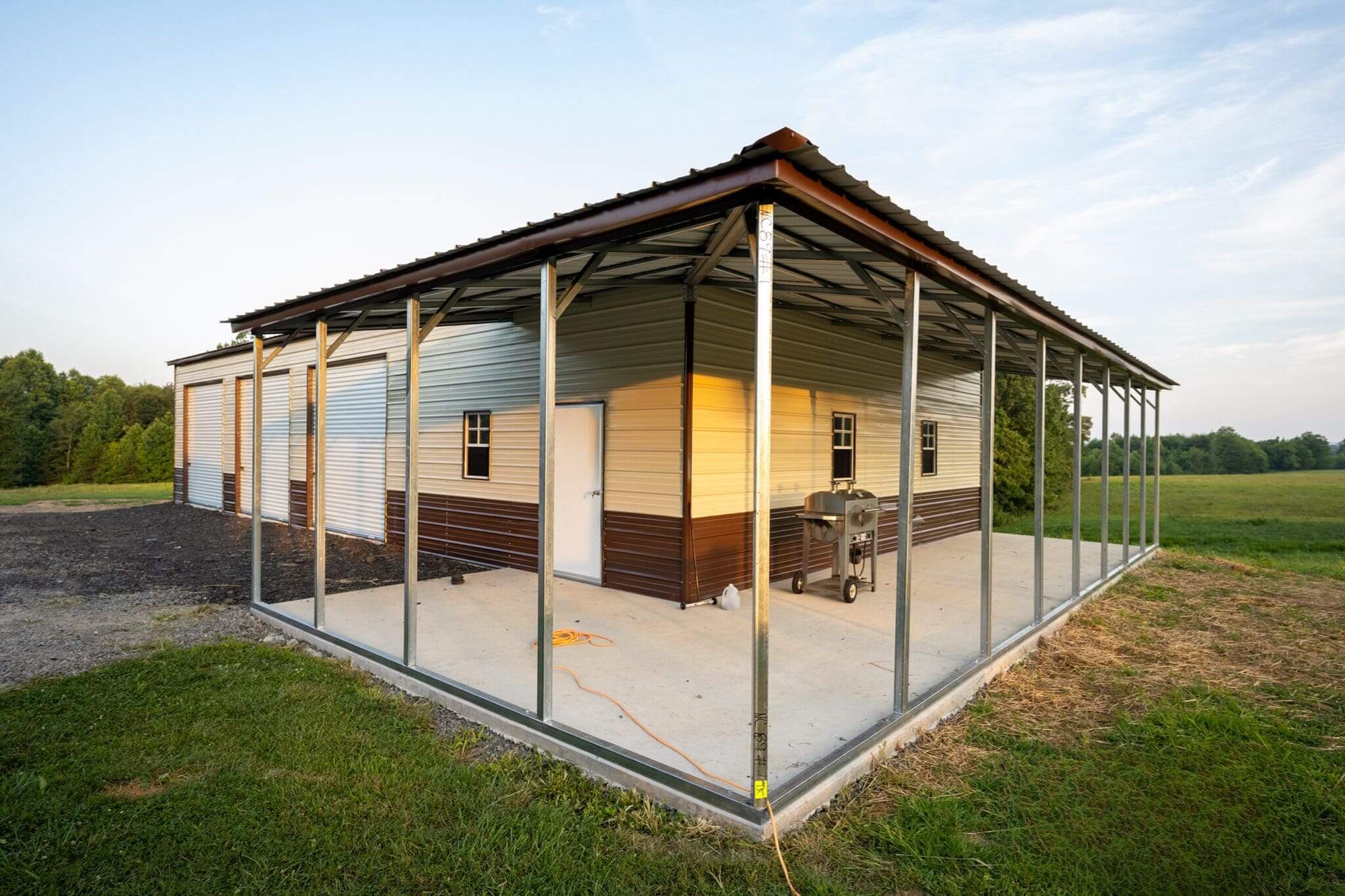 Metal-framed building with siding and roof.